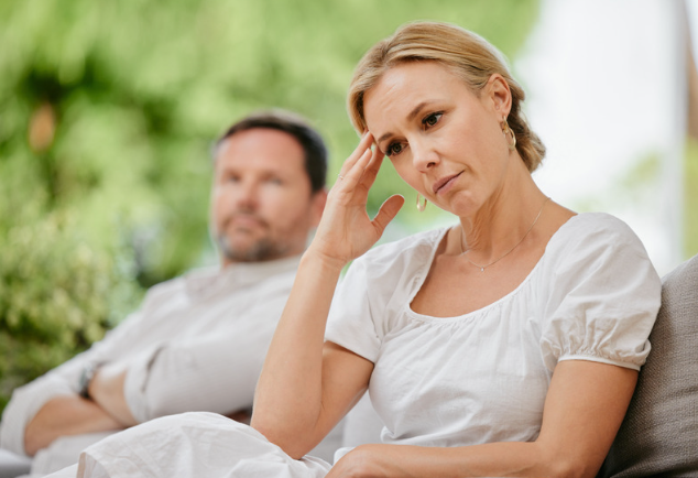 Woman and man having a disagreement at work, Conflict Resolution and wanting stress-free harmony